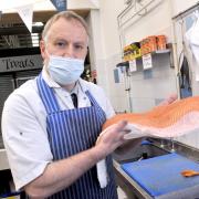 Neil Priestley in his fishmonger's shop in Bradford's Oastler Centre