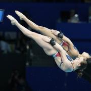 Eden Cheng and Lois Toulson of Britain compete during the women's synchronized 10m platform diving final. Picture: Dmitri Lovetsky.