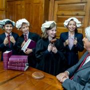Bradford Grammar Year 6 pupils with former pupil, High Court judge Sir Stephen Morris