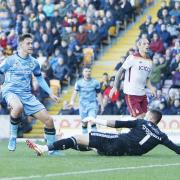 Jake Young scores Forest Green's equaliser against City at Valley Parade in October