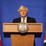 Prime Minister Boris Johnson during a press conference in London's Downing Street on December 8. Pic: PA Wire/Adrian Dennis