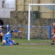 Former Barnoldswick Town man Ben Gorman (blue) scored a hat-trick in Trawden Celtic Juniors' 6-1 win over Carleton Sports Club First team. Picture: Peter Naylor.