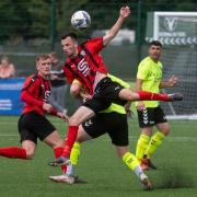 Campion (red and black) are pictured here playing Steeton, with both sides involved in the NWCFL groundhop weekend, which starts tonight. Pic: John Chapman.