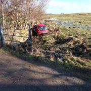 Police found this car abandoned in a field at Denholme. Picture: West Yorkshire Police