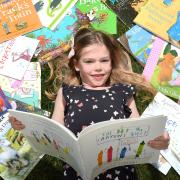 Six-year-old Cleo Cowles, who has raised money for Ukraine with a sponsored read-a-thon