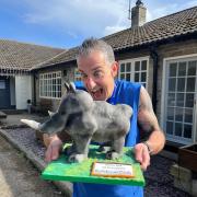 Chris celebrates his 50th Rhino marathon with a special rhino cake