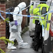 Forensics officers in the Shirley Grove area of Lighcliffe after the death of Dawn Walker