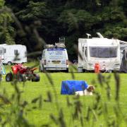 Photo shows the travellers settling in Shelf Park. Picture: Newsquest.