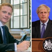 Photo shows Robbie Moore, left, and Boris Johnson right (PA).