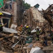 Photo shows rescuers removing debris following a Russian missile attack in Chuhuiv in the Kharkiv region of Ukraine. Picture: PA