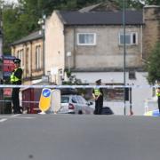 A large police cordon was in place on Great Horton Road following the incident