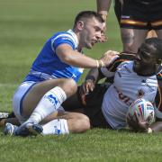 Prop Muizz Mustapha lands awkwardly in a tackle and is forced off. Picture: Tom Pearson