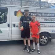 Lola Hird with her sponsor AMC Heating Solutions, of Skipton