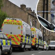 Police vans were parked outside an address on Shetcliffe Lane