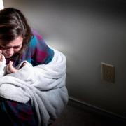 Stock photo portraying a woman who has experienced abuse