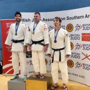 Steven Singh (left) collecting his silver award at the British Masters Judo Championships in London