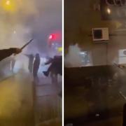 Screenshots from a video showing a group of youths firing fireworks towards the Second West pub