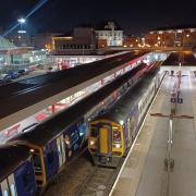 A night view of Bradford Interchange showing Northern trains