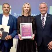 Volunteers Akbar Khan and Greta Arlinskaite received their award from LOCALiQ’s Steve Lowe