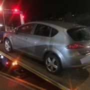 This car was seized by police after reportedly running a red light
