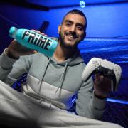 Awais Hussain, of GG Gaming, with a bottle of Prime