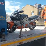 Police recovered this stolen white, black and orange Yamaha motorbike after a chase in Little Horton Lane