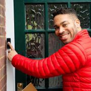Postcode Lottery ambassador Danyl Johnson, pictured, at another house reveal