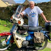 John Stanley, pictured, with the motorbike he was riding at the time of the collision