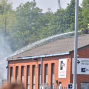 Firefighters fight a fire at a plastics factory in Bramley on Monday