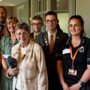 Left to right, Goodwin House resident Ann, teacher Nick Gadsby, the Linking Network’s Linda Cowie, resident Joyce, students Aaron and Ben, teacher Mona Ravandi, and resident Jack