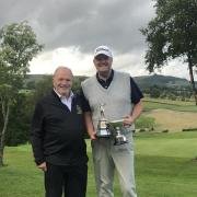 Richard Wheatley (right) with union president David Peat after his third Bradford Open triumph in a row.