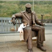 Dave’s granddaughter, Georgia, with the Freddie Gilroy sculpture. Pic: Dave Welbourne