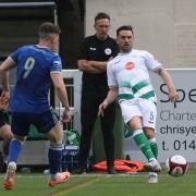 Luca Havern plays a pass earlier this season under the watchful eye of Mark Bower, but the pair are extremely unlikely to be reunited at Guiseley.