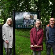 Astrid Hansen, second left, unveiled a new notice board at the former St Matthew's Church in Wilsden