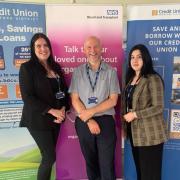 BDCU employees Siobhan Graham, Ian Brewer and Fizza Mumtaz attend an event at Airedale Hospital