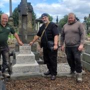 Chris Lawson, Graham Swain, Riaz Ahmed and Craig Magson at the grave