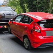 A red Ford Fiesta was seized by police for having a faulty brake light and dangerous tyre in Wrose