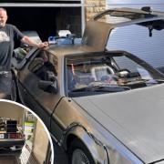 Mike Hutchinson with the replica of Back to the Future's DeLorean that he has built at his East Morton home