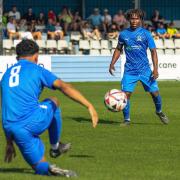 Talent Ndlovu (facing camera) scored at a crucial time for Eccleshill in their important draw at Pickering.