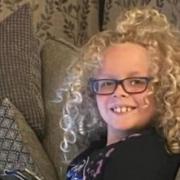 Harvey Munt, 11, will get his long curly hair cut for charity