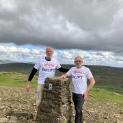 Andy White, left and Mike Keel at the summit of Penyghent