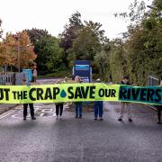 Activists from Cut the Crap, Shipley deliver a petition to Yorkshire Water headquarters in Bradford