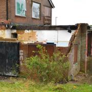One of the derelict buildings that will be demolished