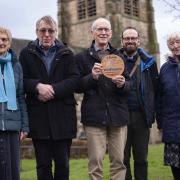 Left to right: Bradford Cathedral eco church team, Elaine de Villiers, Reverend Colin Penfold, Mike de Villiers, Reverend Canon Ned Lunn, Reverend Canon Cathy Milford