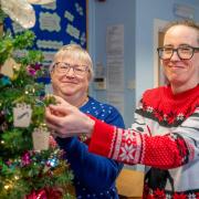 Shearbridge Vets receptionists Julie Sutcliffe and Lucy Bashforth with the memory tree