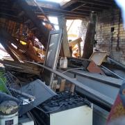 The scene inside two Bradford properties undergoing demolition last week.