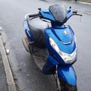Police spotted two men in balaclavas riding this blue Peugeot Kisbee moped in the Allerton area of Bradford