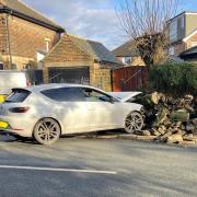 A car crashed into a wall on Uppermoor in Pudsey this morning.