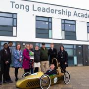 Vaughan Curnow at Greenpower Education Trust, fourth right, with staff and students from Tong Leadership Academy