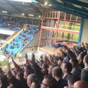 Halifax Town fans celebrating a victory at The Shay